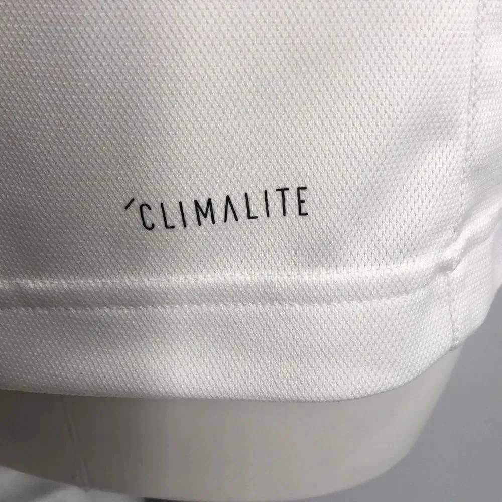 Adidas white with black trim tank